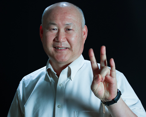 Dr. Jaesub Lee holds up his Cougar Paw